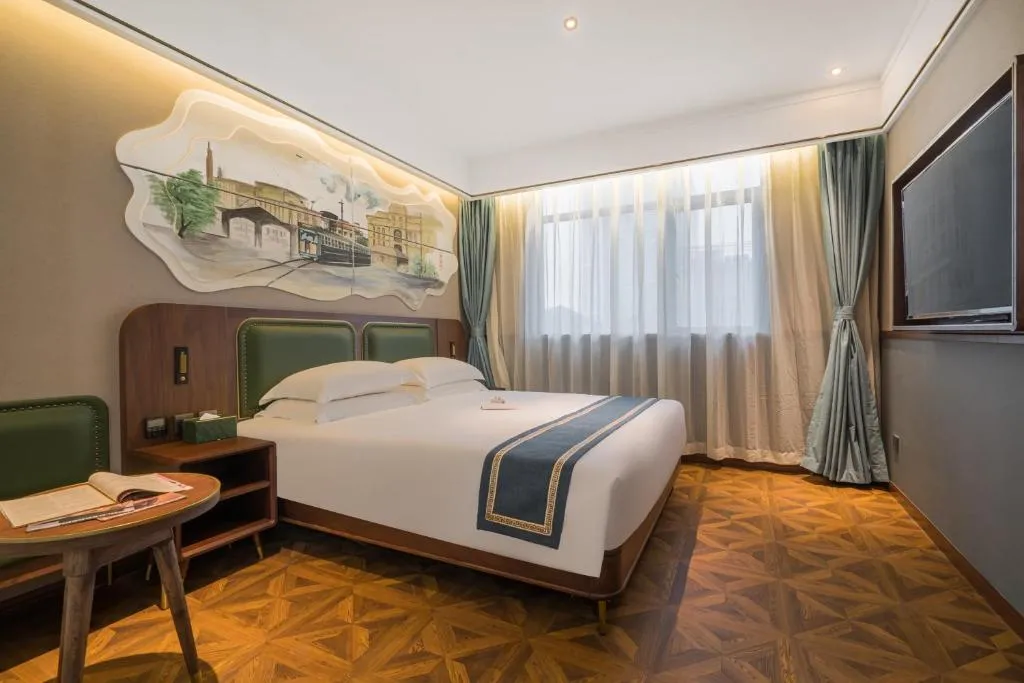 Image of Nost algia S Hotel Near Shanghai Fudan University- The Bund, The Pearl Tower, Free ice cream, mineral water, coffee, snacks and laundry service, Free GYM, English communication well